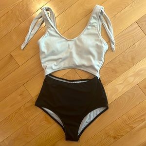 Small, one piece swimsuit, black and white